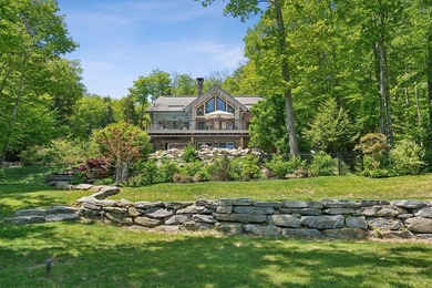 Experience exceptional lakeside living in this custom-built log - photo 8