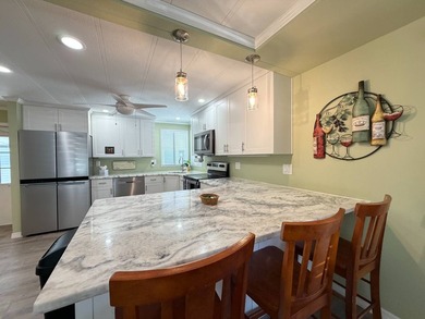 Welcome to the vibrant, gated Jamaica Bay community of Fort - photo 8