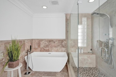 Just one house from the ocean, this fully gated luxury residence - photo 35