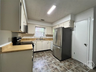 Welcome to easy low-maintenance living in Savannah's premiere - photo 7