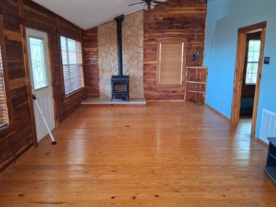 This 884 sq ft log cabin sits in Sardis Acres overlooking the - photo 2