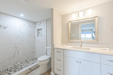 TOTALLY REDONE! ALL ASSESSMENTS PAID! This gorgeous condo has