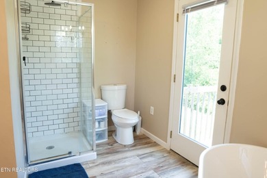 Half an acre. A creek. A master bath that belongs in a magazine - photo 15
