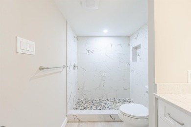 TOTALLY REDONE! ALL ASSESSMENTS PAID! This gorgeous condo has