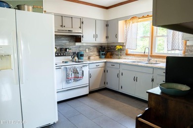 Half an acre. A creek. A master bath that belongs in a magazine - photo 17
