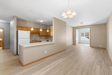 This well-maintained one-level townhome offers approximately 1 - photo 3