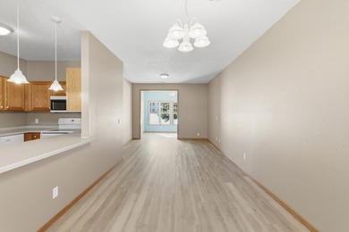 This well-maintained one-level townhome offers approximately 1 - photo 4