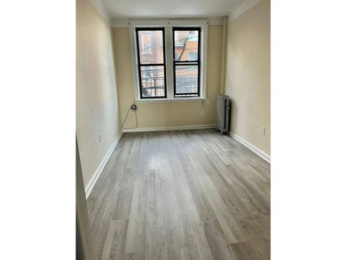 Exceptional opportunity to own a fully renovated 6-family brick - photo 8