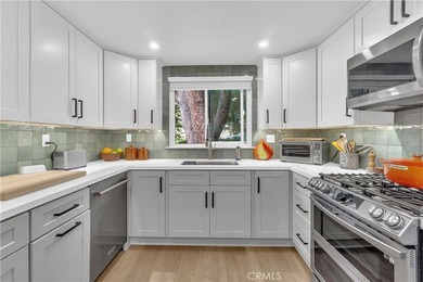 This 3-bedroom, 2-bath upstairs condo is beautifully updated - photo 6