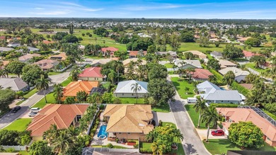 Lovingly maintained this custom built residence offers timeless - photo 2