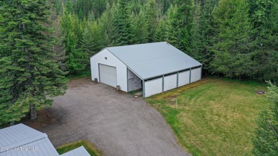 Enjoy peaceful Priest Lake living in this charming, newly - photo 40