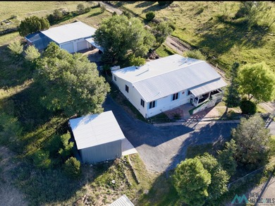 Storrie Lake Home For Sale in Las Vegas New Mexico