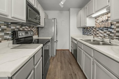 Soaring above the city on the 23rd floor, this refined 2-bedroom - photo 9