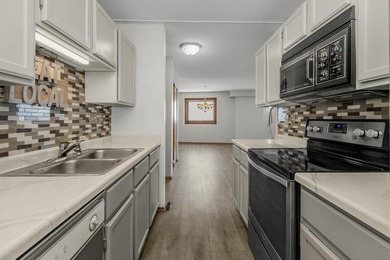 Soaring above the city on the 23rd floor, this refined 2-bedroom - photo 10