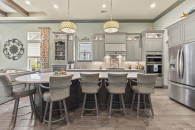 Welcome to 5972 Bolsena Place, an exceptional custom-built - photo 11