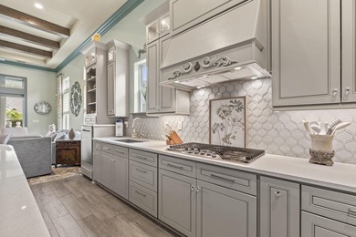 Welcome to 5972 Bolsena Place, an exceptional custom-built - photo 12