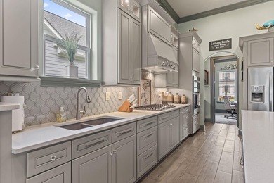 Welcome to 5972 Bolsena Place, an exceptional custom-built - photo 13