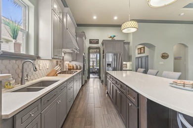Welcome to 5972 Bolsena Place, an exceptional custom-built - photo 14
