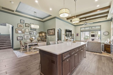 Welcome to 5972 Bolsena Place, an exceptional custom-built - photo 15