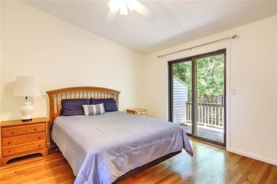 This well-maintained townhouse-style condominium is located in - photo 15