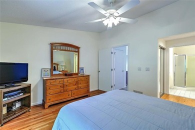 This well-maintained townhouse-style condominium is located in - photo 16