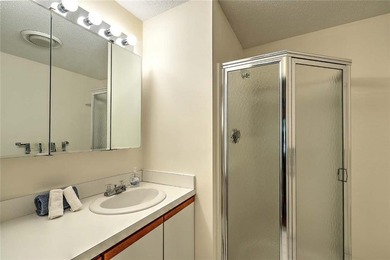 This well-maintained townhouse-style condominium is located in - photo 18