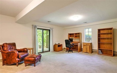 This well-maintained townhouse-style condominium is located in - photo 24