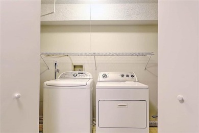 This well-maintained townhouse-style condominium is located in - photo 25