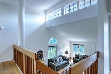 This well-maintained townhouse-style condominium is located in - photo 26