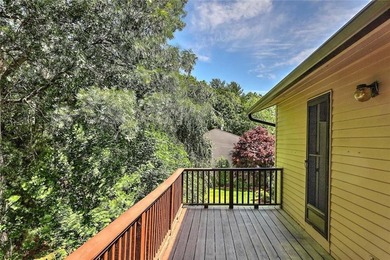 This well-maintained townhouse-style condominium is located in - photo 27