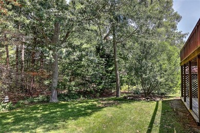 This well-maintained townhouse-style condominium is located in - photo 28