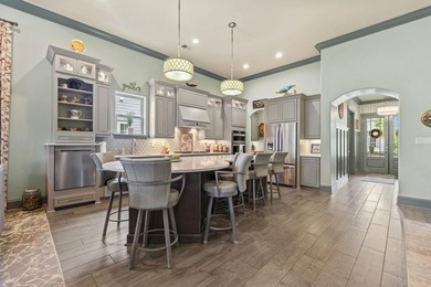 Welcome to 5972 Bolsena Place, an exceptional custom-built - photo 33