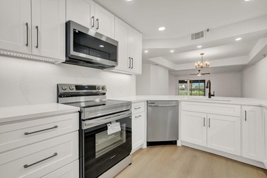 Enjoy effortless living in this beautifully updated 2 bedroom, 2 - photo 1