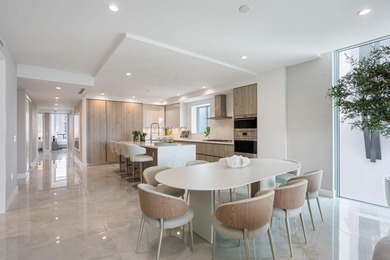 NEW FOUR BEDROOM PLUS DEN, HALF-FLOOR RESIDENCE IN THE HEART OF