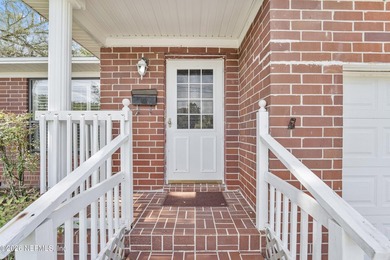 Welcome to this charming all-brick home in Killarney Shores - photo 3