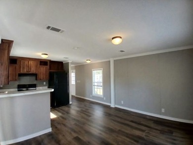 Own your own home in a quiet, well-maintained neighborhood! This - photo 2