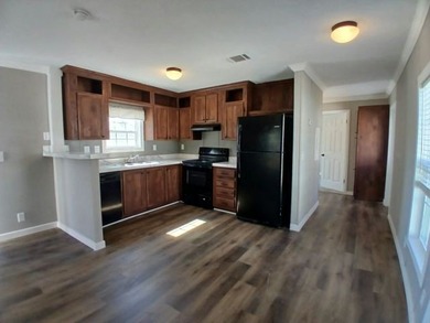 Own your own home in a quiet, well-maintained neighborhood! This - photo 3