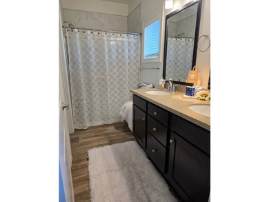2023 Skyline Home. This 3-bedroom, 2-bath home offers a warm and - photo 11