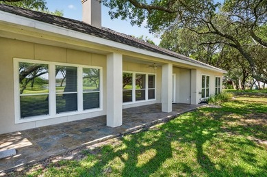 Nestled beneath a canopy of majestic oak trees and overlooking - photo 28