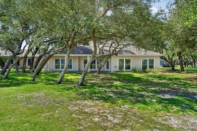 Nestled beneath a canopy of majestic oak trees and overlooking - photo 30