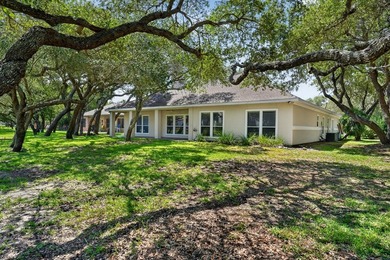 Nestled beneath a canopy of majestic oak trees and overlooking - photo 31