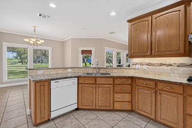 Nestled beneath a canopy of majestic oak trees and overlooking - photo 45