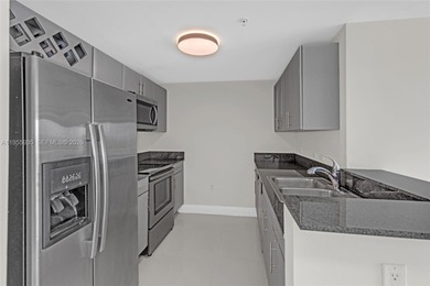 Experience elevated Miami living at Terrazas at Riverpark. This