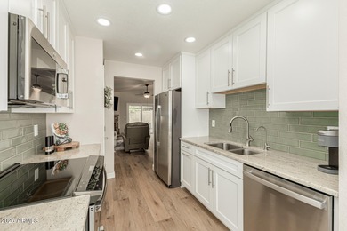 Welcome to your dream home-an impeccably updated 3-bed, 2-bath