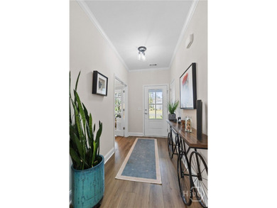 Over $100K in builder upgrades! This highly desired single-level - photo 4