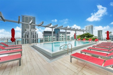 High above the urban core, this exclusive corner residence - photo 12