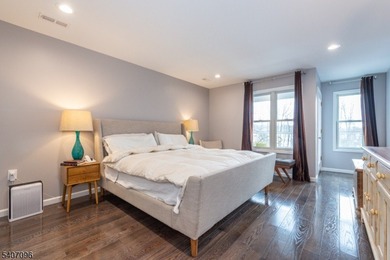 Experience elevated lakefront living in this stylish townhouse - photo 11