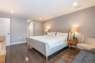 Experience elevated lakefront living in this stylish townhouse - photo 13