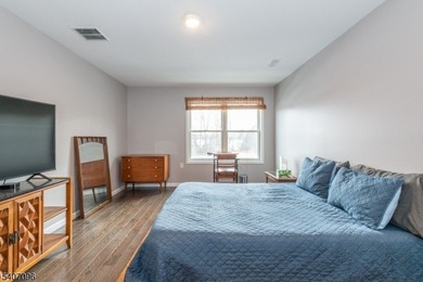 Experience elevated lakefront living in this stylish townhouse - photo 17