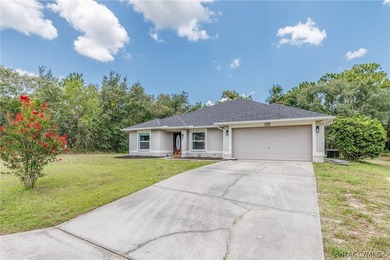 WOW HURRY AND GET THIS 4/2/2 CAR GARAGE HOME SUGARMILL WOODS!! - photo 1